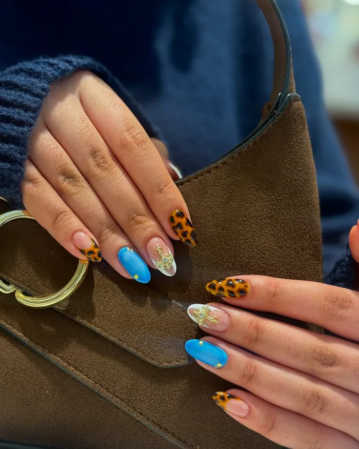 Gel nail art in soft blue tones